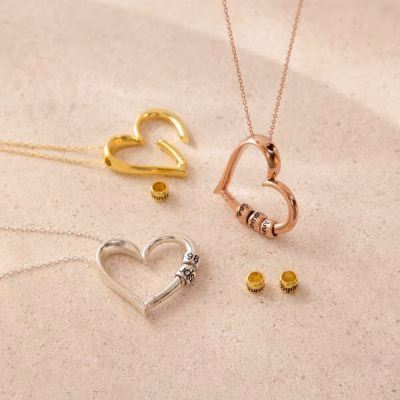 Collana con pendente a cuore inciso personalizzato con perline