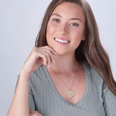 Collana di famiglia con pietre portafortuna placcate in oro